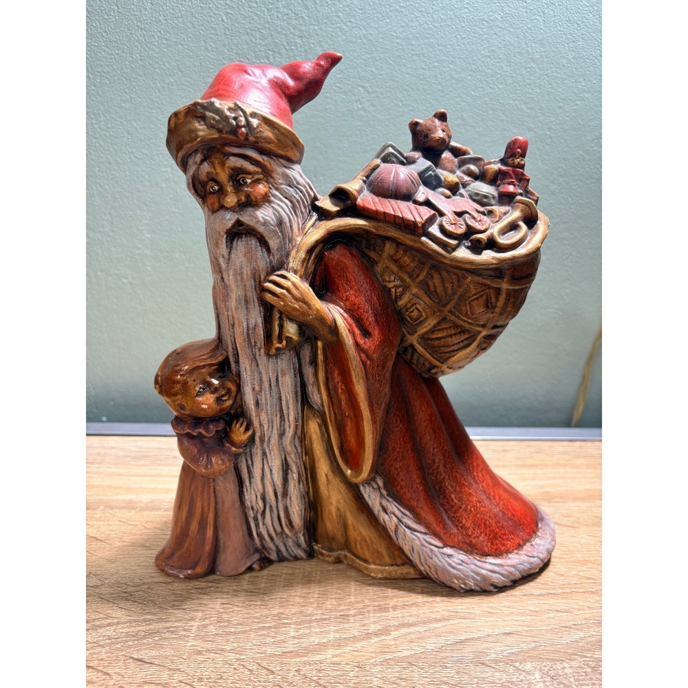 Vintage Rustic Santa Claus Figurine with Toy Sack and Child Christmas Decor